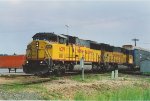 Southbound vehicle train eases through Airline